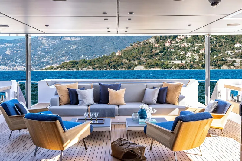Miotu Yacht Photos Pics Luxurious 2022 Custom Line CL 140 yacht deck with elegant seating and scenic ocean view.