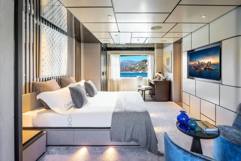 Miotu Yacht Photos Pics Luxurious yacht bedroom interior, Custom Line CL 140, 2022 model, with ocean view and modern decor.