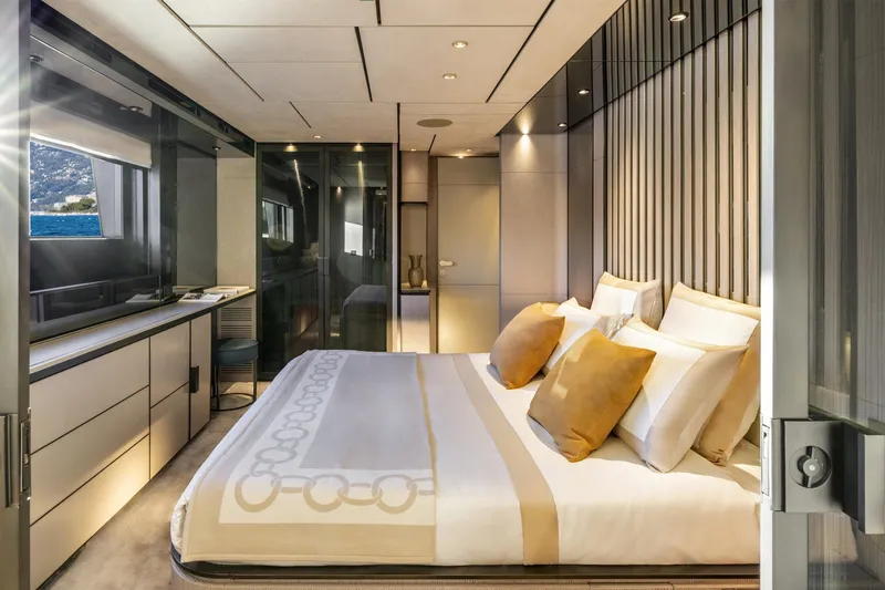 Miotu Yacht Photos Pics Luxurious bedroom interior on Custom Line CL 140 yacht, 2022 model, featuring elegant design and sea view.