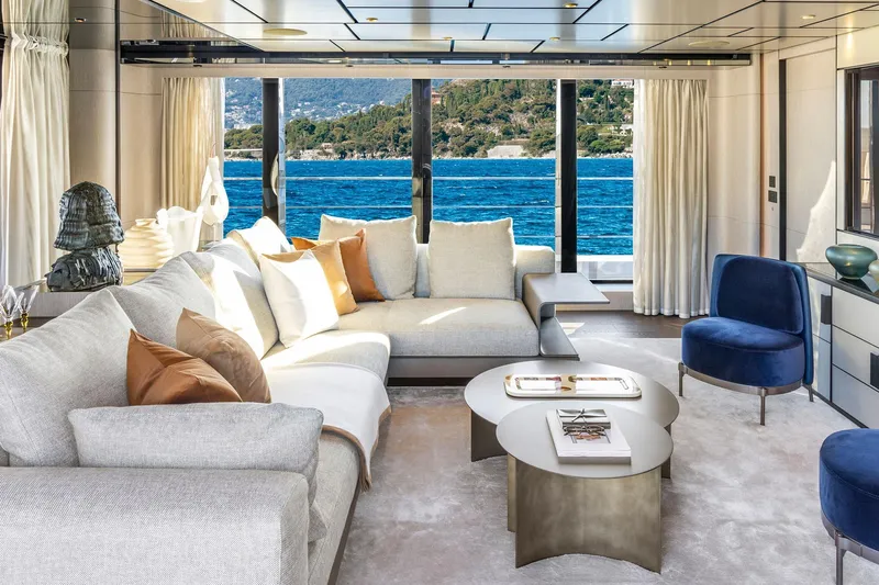 Miotu Yacht Photos Pics Luxurious yacht interior with modern decor, featuring a spacious lounge area and ocean view. Custom Line CL 140, 2022.