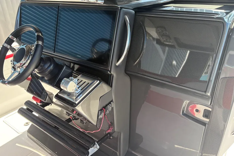  Yacht Photos Pics 2022 Nor-Tech 452 Super Fish helm with dual screens and modern controls.