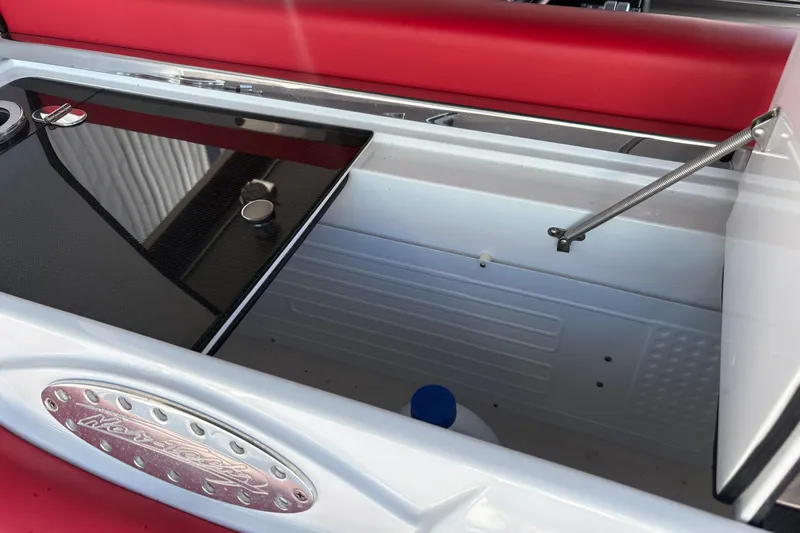  Yacht Photos Pics 2022 Nor-Tech 452 Super Fish interior storage compartment with red seating and sleek design.