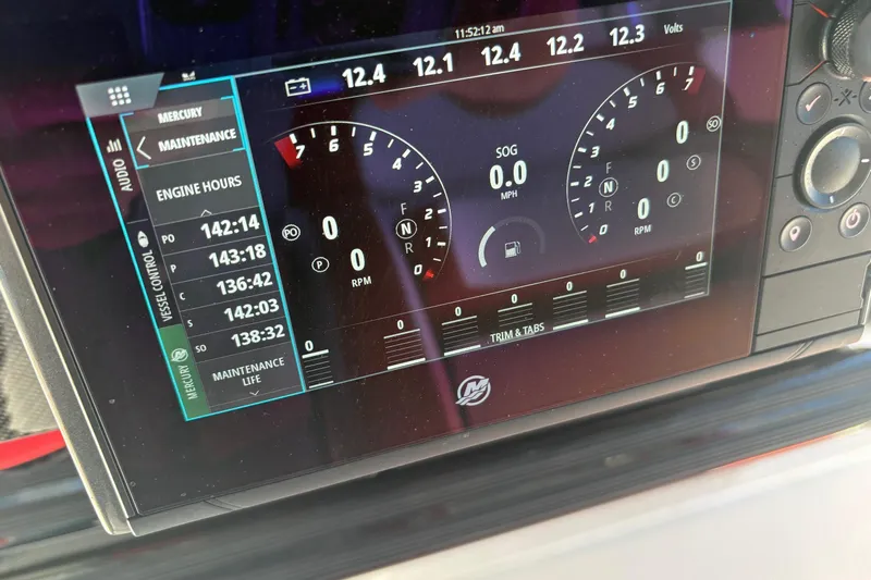  Yacht Photos Pics Dashboard display of 2022 Nor-Tech 452 Super Fish showing engine hours and controls.