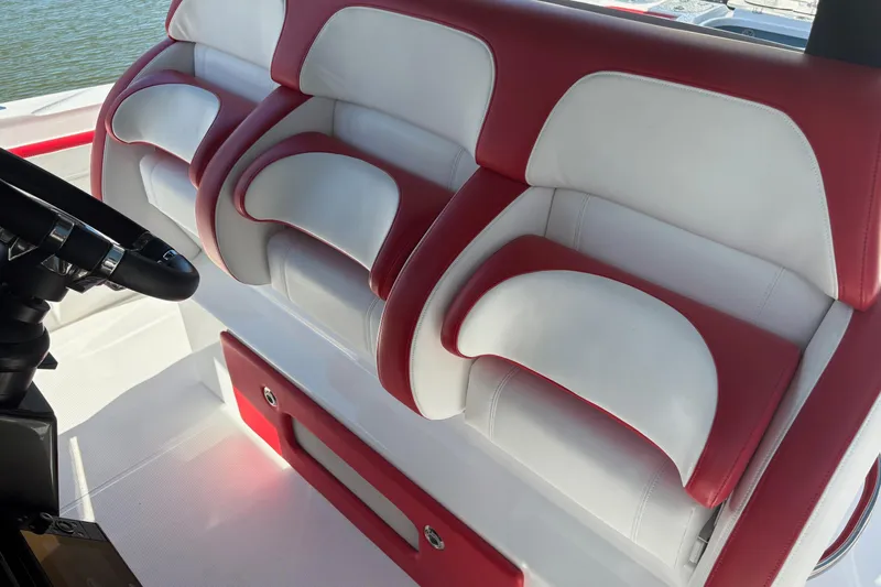  Yacht Photos Pics Red and white seating on 2022 Nor-Tech 452 Super Fish boat interior.