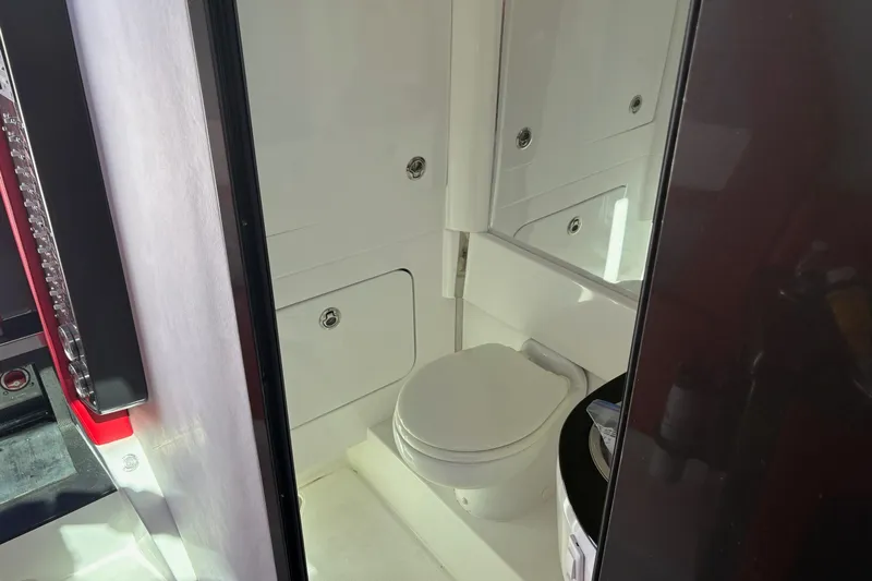  Yacht Photos Pics 2022 Nor-Tech 452 Super Fish boat interior bathroom with modern fixtures.