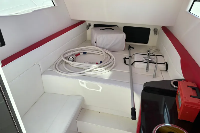  Yacht Photos Pics Interior of 2022 Nor-Tech 452 Super Fish boat with seating and equipment storage.