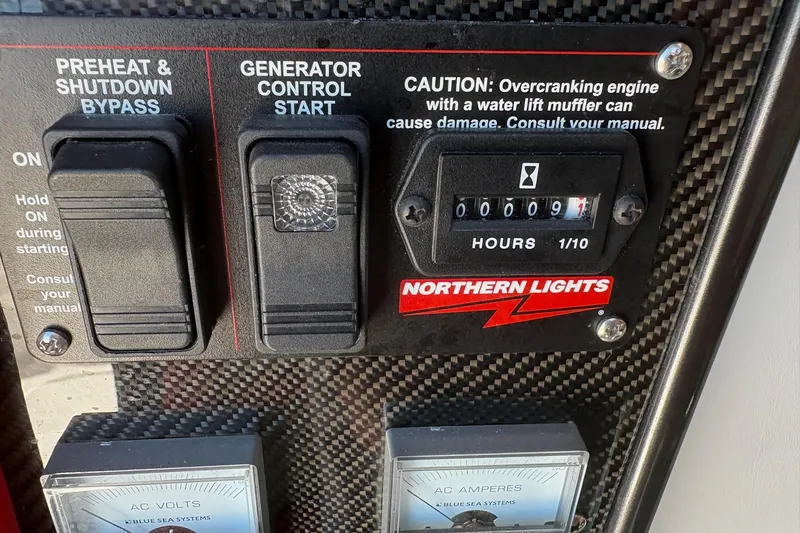  Yacht Photos Pics Control panel of 2022 Nor-Tech 452 Super Fish with generator and preheat switches.