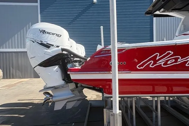  Yacht Photos Pics 2022 Nor-Tech 452 Super Fish boat with powerful outboard engine, docked in marina.