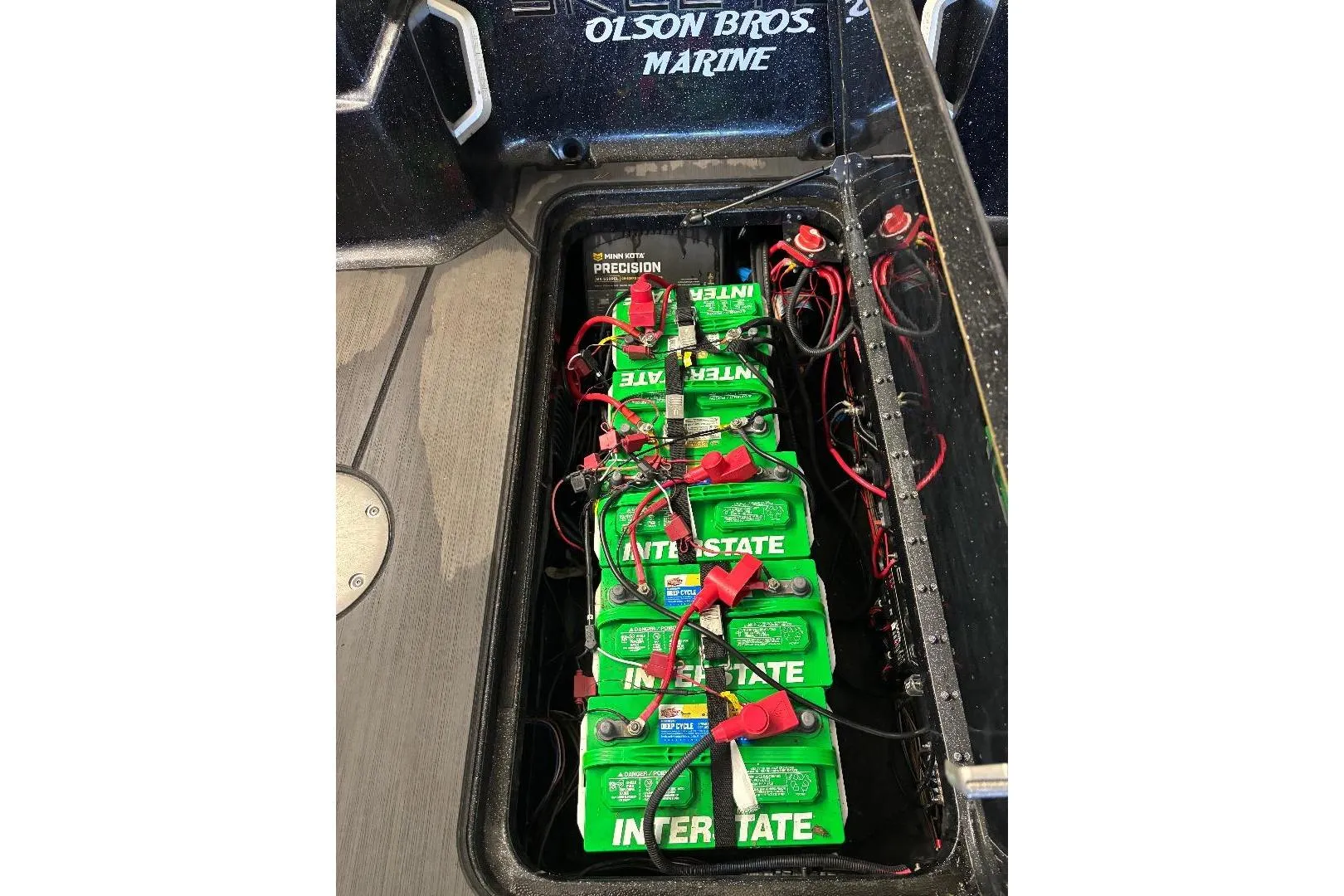 Battery compartment of 2025 Skeeter WXR2260 boat with Interstate batteries and wiring.