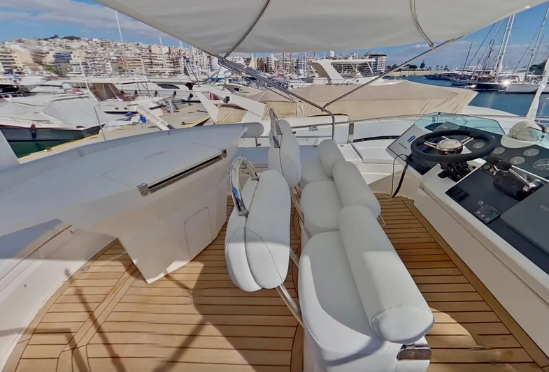  Yacht Photos Pics Luxurious 2000 Fairline Squadron 52 yacht with spacious deck and modern helm station.