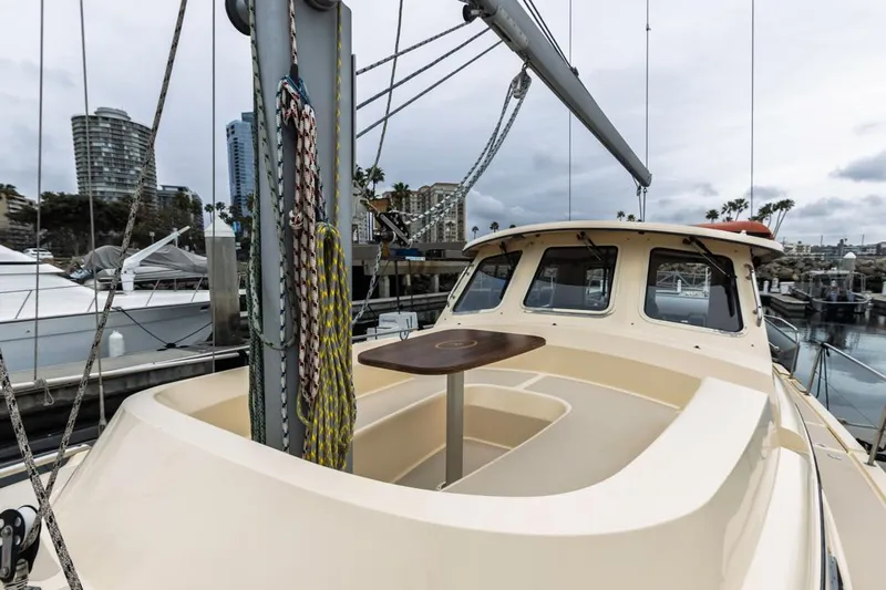 Seeker Yacht Photos Pics 2007 Island Packet SP Cruiser sailboat docked, featuring a spacious deck and modern design.