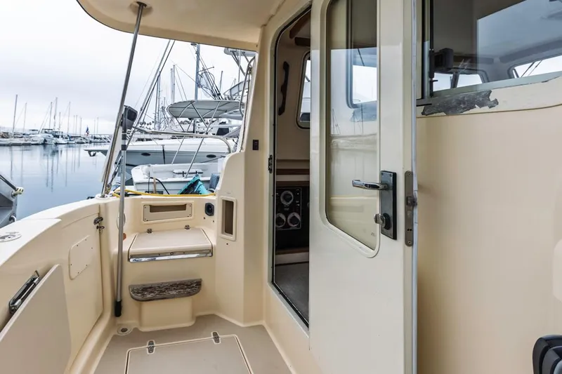 Seeker Yacht Photos Pics 2007 Island Packet SP Cruiser yacht interior with open door, docked at marina.