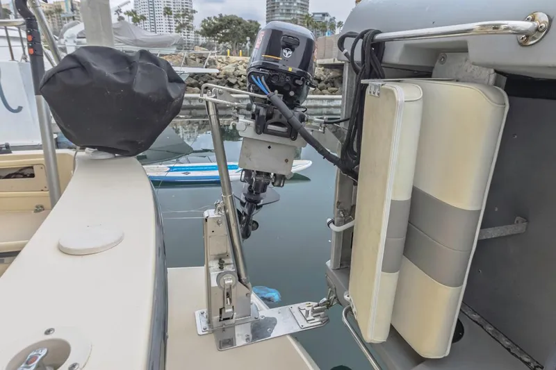 Seeker Yacht Photos Pics 2007 Island Packet SP Cruiser with mounted outboard motor at marina.