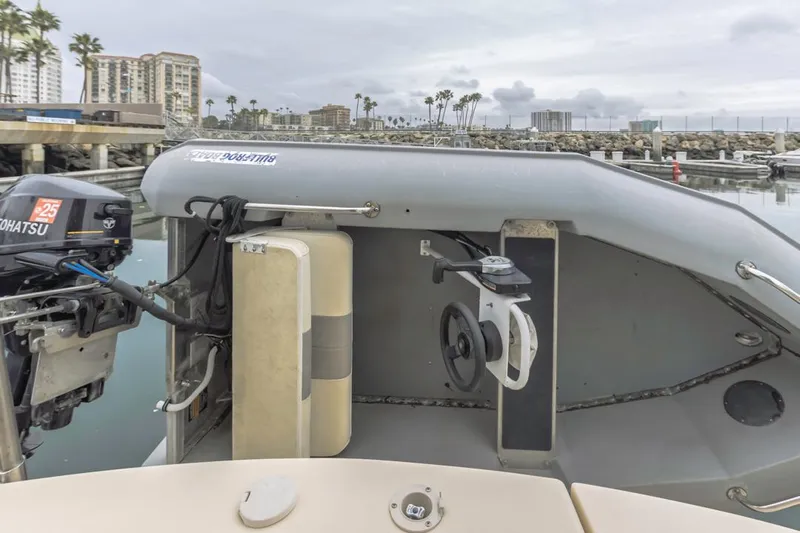 Seeker Yacht Photos Pics 2007 Island Packet SP Cruiser with outboard motor at marina dock.