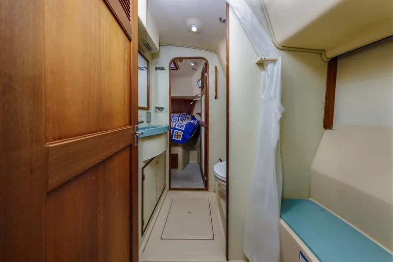 Seeker Yacht Photos Pics 2007 Island Packet SP Cruiser interior with bathroom and cabin view.