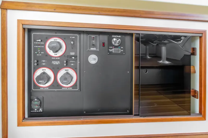 Seeker Yacht Photos Pics Control panel of a 2007 Island Packet SP Cruiser yacht, featuring switches and gauges.