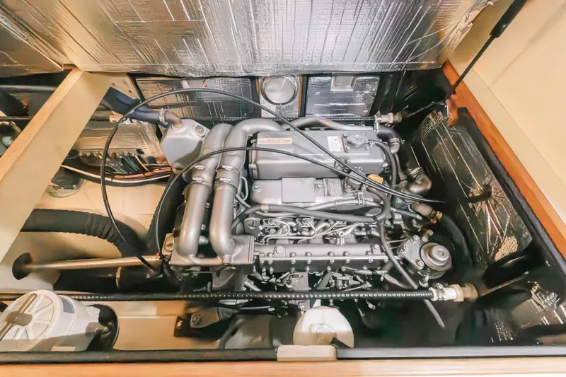 Seeker Yacht Photos Pics Engine compartment of a 2007 Island Packet SP Cruiser, showcasing detailed mechanical components.