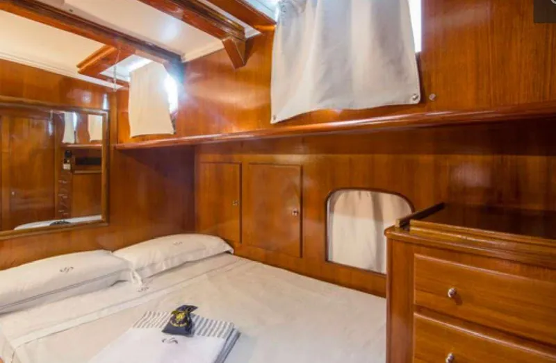 Sea Prince Yacht Photos Pics Luxurious wooden cabin interior of 1953 Abeking & Rasmussen Motor Sailer.