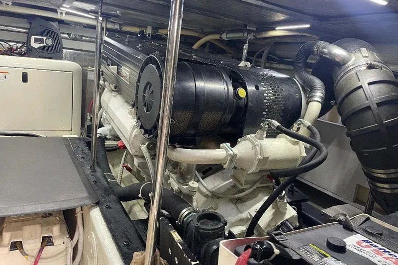  Yacht Photos Pics Engine room of 2004 Carver 570 Voyager Pilothouse with visible machinery and components.