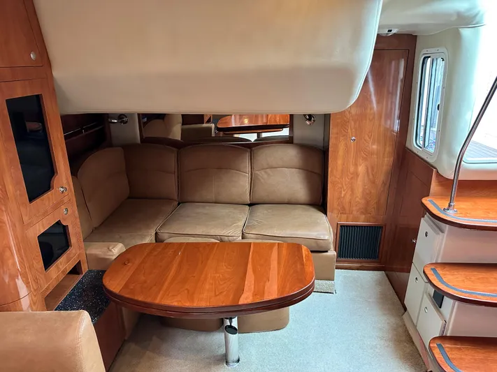  Yacht Photos Pics Interior of 2007 Four Winns 378 Vista yacht with leather seating and wooden finishes.