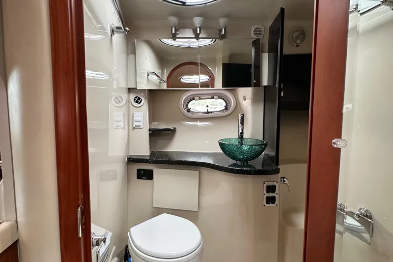  Yacht Photos Pics Luxurious bathroom in 2007 Four Winns 378 Vista yacht with modern fixtures and elegant design.