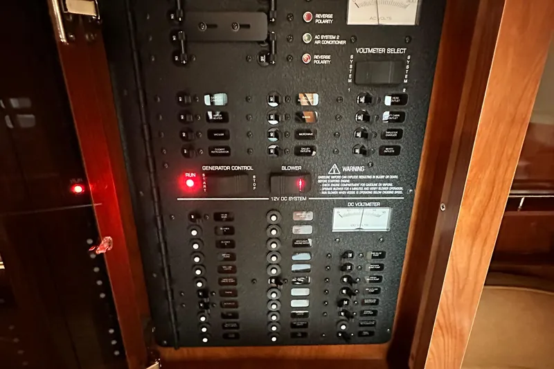  Yacht Photos Pics Control panel of a 2007 Four Winns 378 Vista boat with switches and indicators.