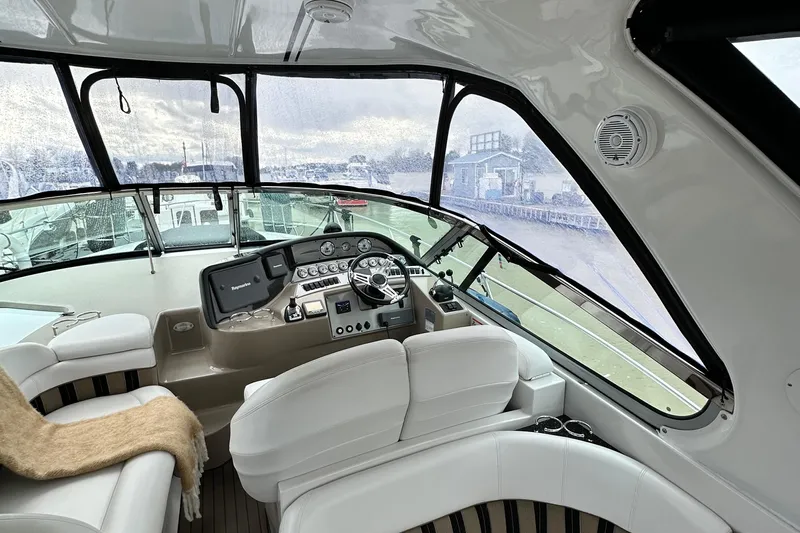  Yacht Photos Pics 2007 Four Winns 378 Vista yacht cockpit with modern controls and panoramic windows.