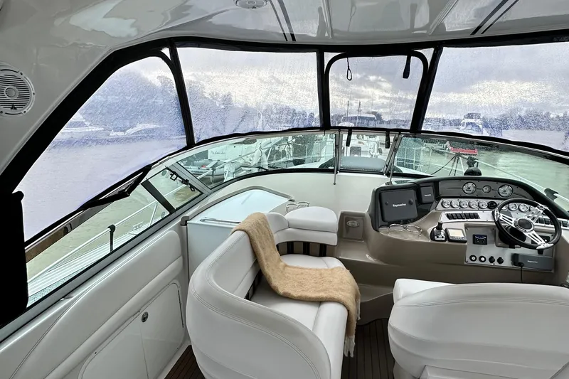  Yacht Photos Pics 2007 Four Winns 378 Vista yacht interior with helm and seating area.