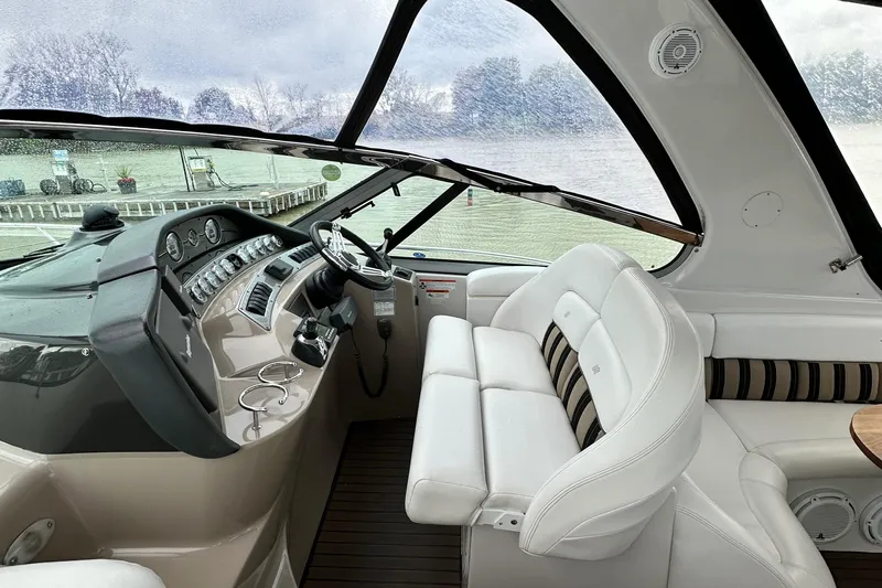  Yacht Photos Pics 2007 Four Winns 378 Vista boat interior with white seating and control panel.