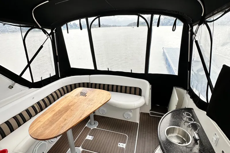  Yacht Photos Pics 2007 Four Winns 378 Vista boat interior with seating, table, and sink.