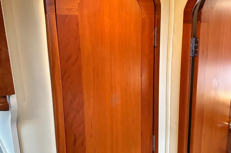  Yacht Photos Pics Wooden interior door of 2007 Four Winns 378 Vista yacht cabin.