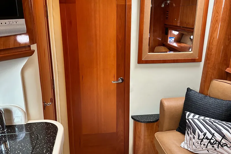  Yacht Photos Pics Interior of 2007 Four Winns 378 Vista yacht with wood finishes and modern amenities.