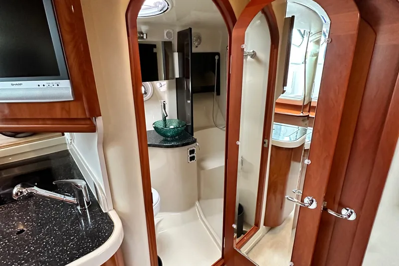  Yacht Photos Pics Luxurious 2007 Four Winns 378 Vista yacht interior with modern bathroom and sleek design.