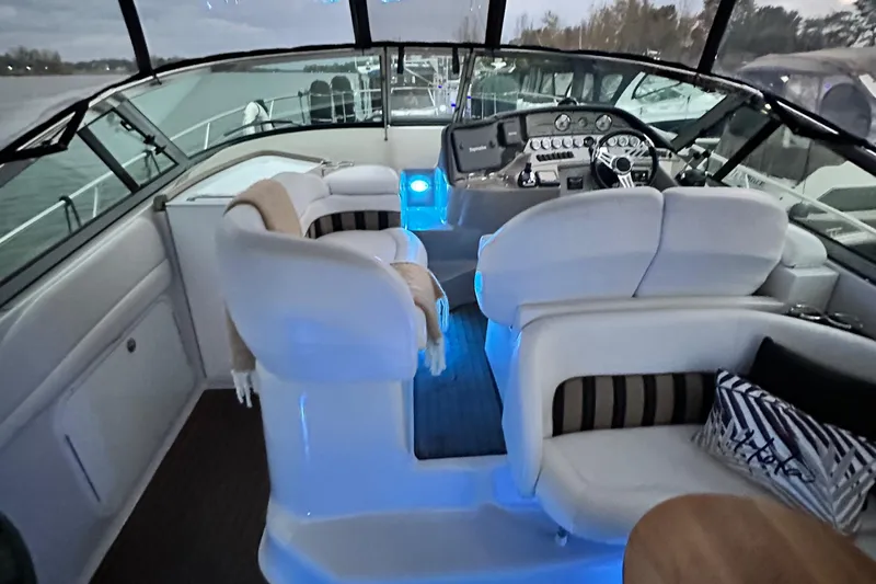  Yacht Photos Pics 2007 Four Winns 378 Vista boat interior with illuminated cockpit and plush seating.