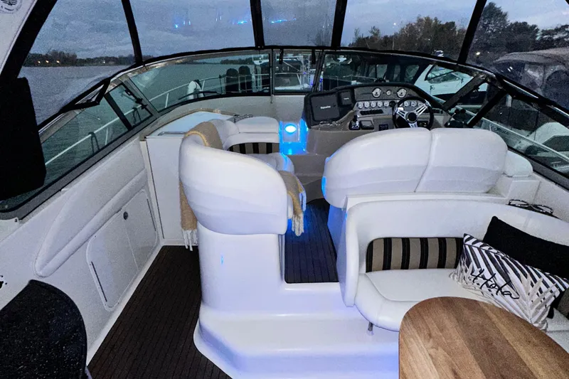  Yacht Photos Pics 2007 Four Winns 378 Vista boat interior with white seating and modern dashboard.