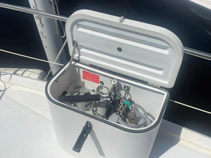 Sea Fever Yacht Photos Pics Open storage compartment on 1987 Symbol 44 Sun Deck MK II boat deck.