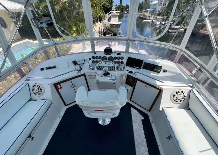 Sea Fever Yacht Photos Pics 1987 Symbol 44 Sun Deck MK II helm with modern controls and panoramic view.