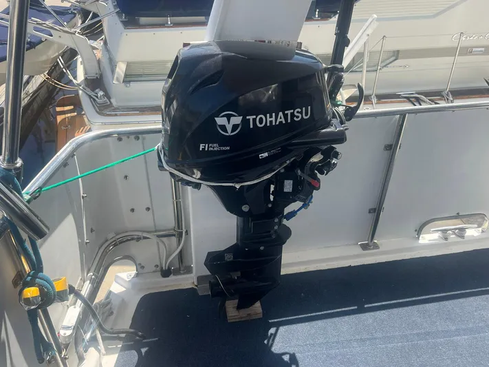 Sea Fever Yacht Photos Pics Tohatsu outboard motor on 1987 Symbol 44 Sun Deck MK II yacht.