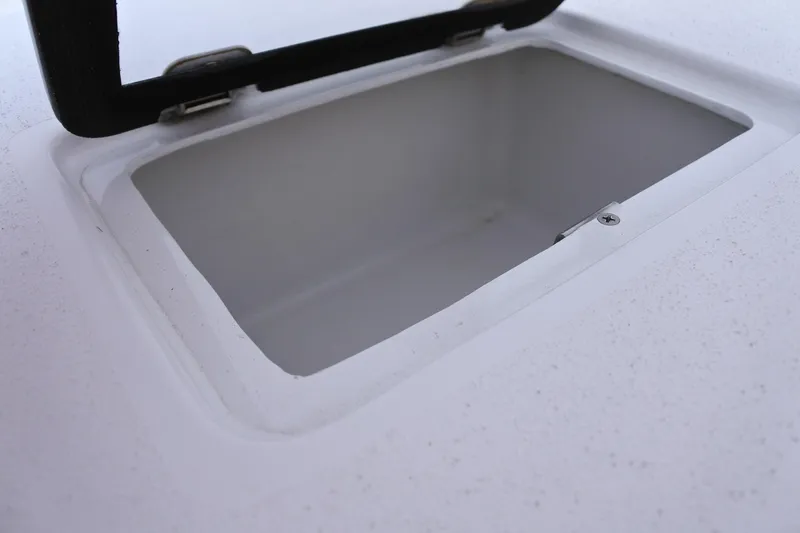  Yacht Photos Pics Open storage compartment on 2022 Conch 33 boat deck.