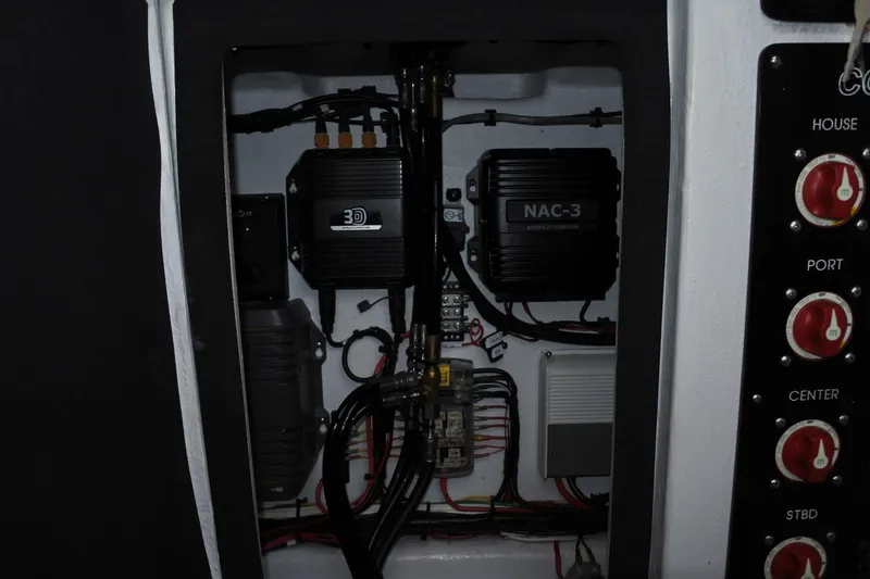  Yacht Photos Pics Electrical panel of a 2022 Conch 33 boat with wiring and control systems.