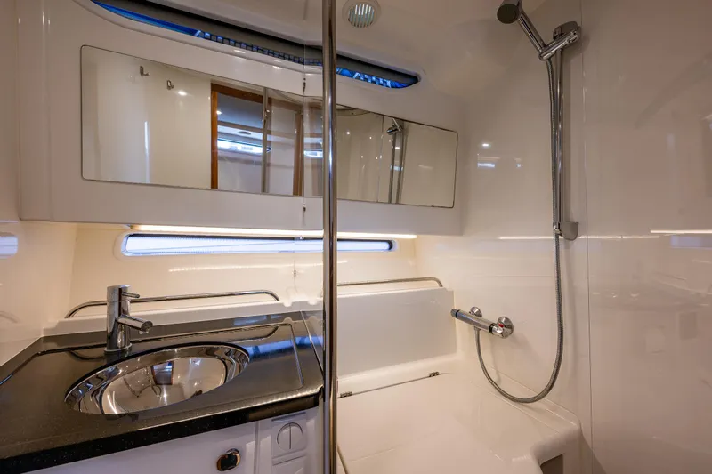 Rylea Rose Yacht Photos Pics Luxurious bathroom in 2021 Nimbus C11 yacht with modern fixtures and sleek design.