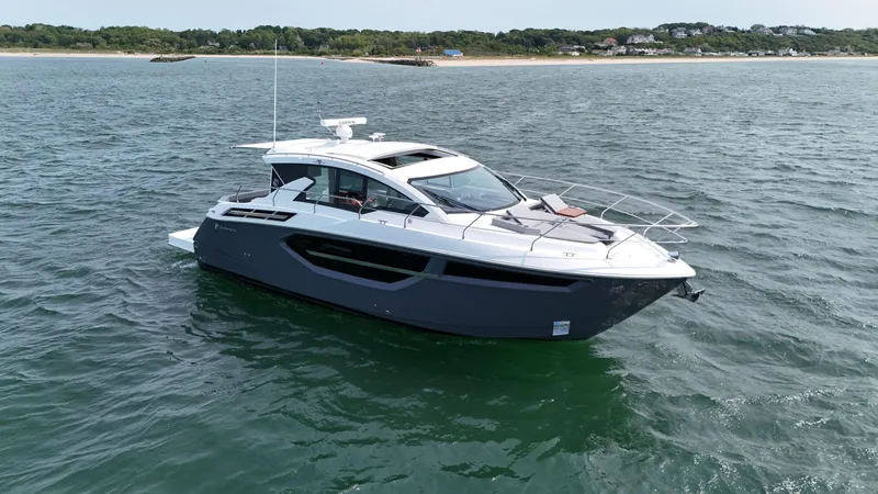 2023 Cruisers 42 Cantius Yacht Photos Pics 2023 Cruisers Yachts 42 Cantius on open water, showcasing sleek design and luxury features.