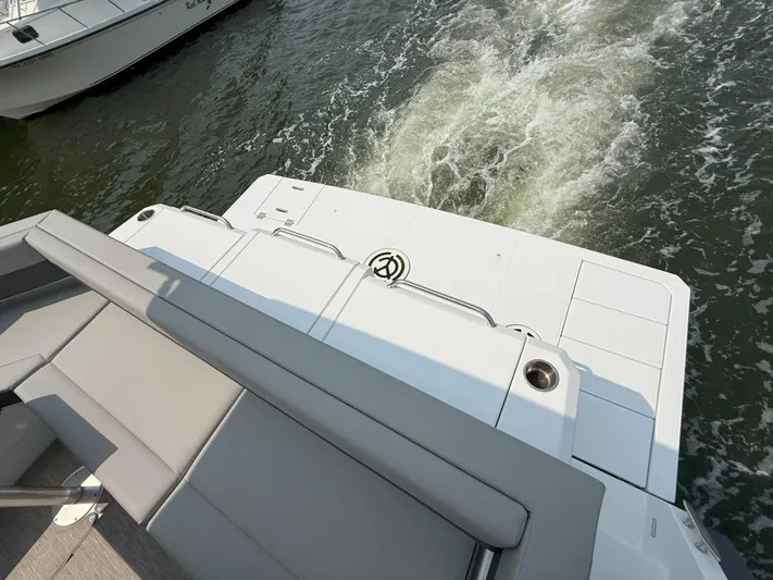 2023 Cruisers 42 Cantius Yacht Photos Pics 2023 Cruisers Yachts 42 Cantius rear deck with water view.