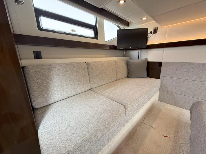 2023 Cruisers 42 Cantius Yacht Photos Pics Luxurious interior of 2023 Cruisers Yachts 42 Cantius with plush seating and modern amenities.