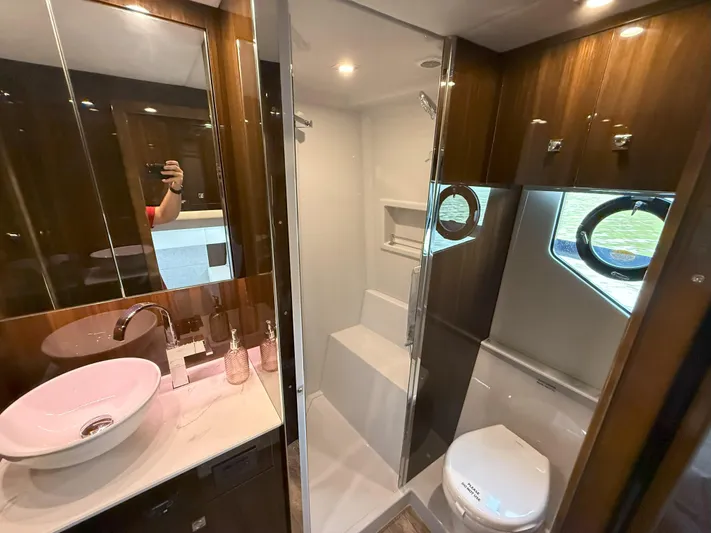 2023 Cruisers 42 Cantius Yacht Photos Pics Luxurious bathroom in 2023 Cruisers Yachts 42 Cantius with modern fixtures and elegant design.