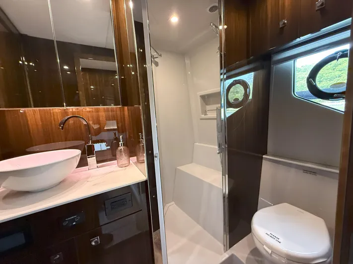 2023 Cruisers 42 Cantius Yacht Photos Pics Luxurious bathroom in 2023 Cruisers Yachts 42 Cantius with modern fixtures and elegant design.