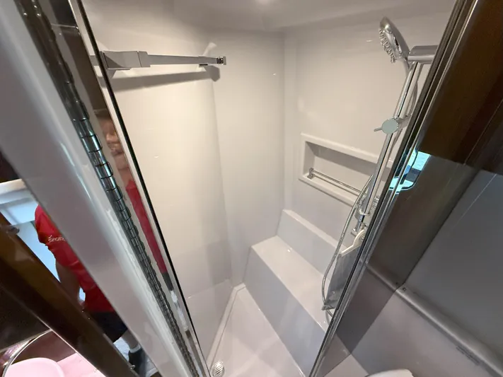 2023 Cruisers 42 Cantius Yacht Photos Pics 2023 Cruisers Yachts 42 Cantius shower area with modern fixtures and sleek design.