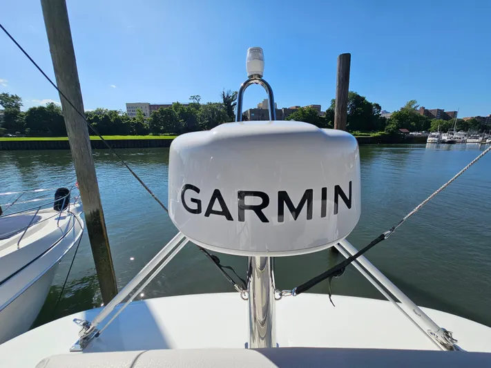  Yacht Photos Pics 2024 Beneteau Antares 12 with Garmin radar on calm water.