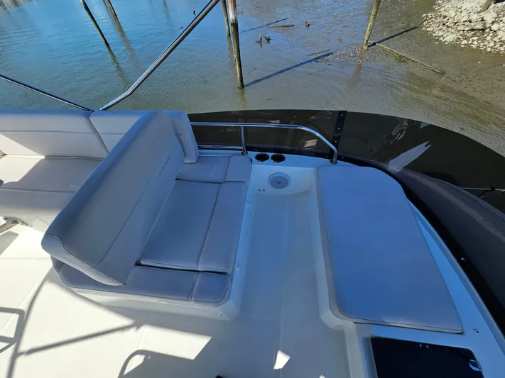  Yacht Photos Pics 2024 Beneteau Antares 12 boat seating area with water view.