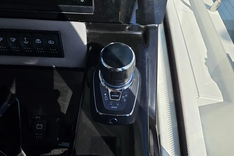  Yacht Photos Pics Control panel of 2024 Beneteau Antares 12 boat with joystick and buttons.